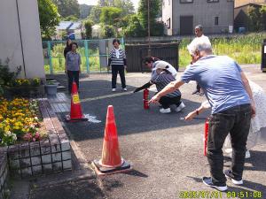 水消火器による消火訓練